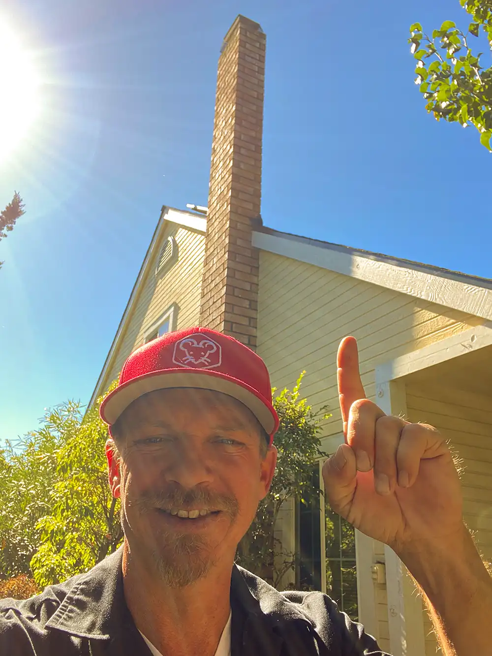 Pointing at roof and attic.